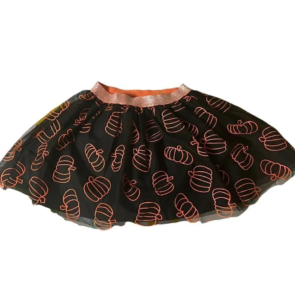 Black tutu orange pumpkins adorn this adorable fall Cat & Jack skirt